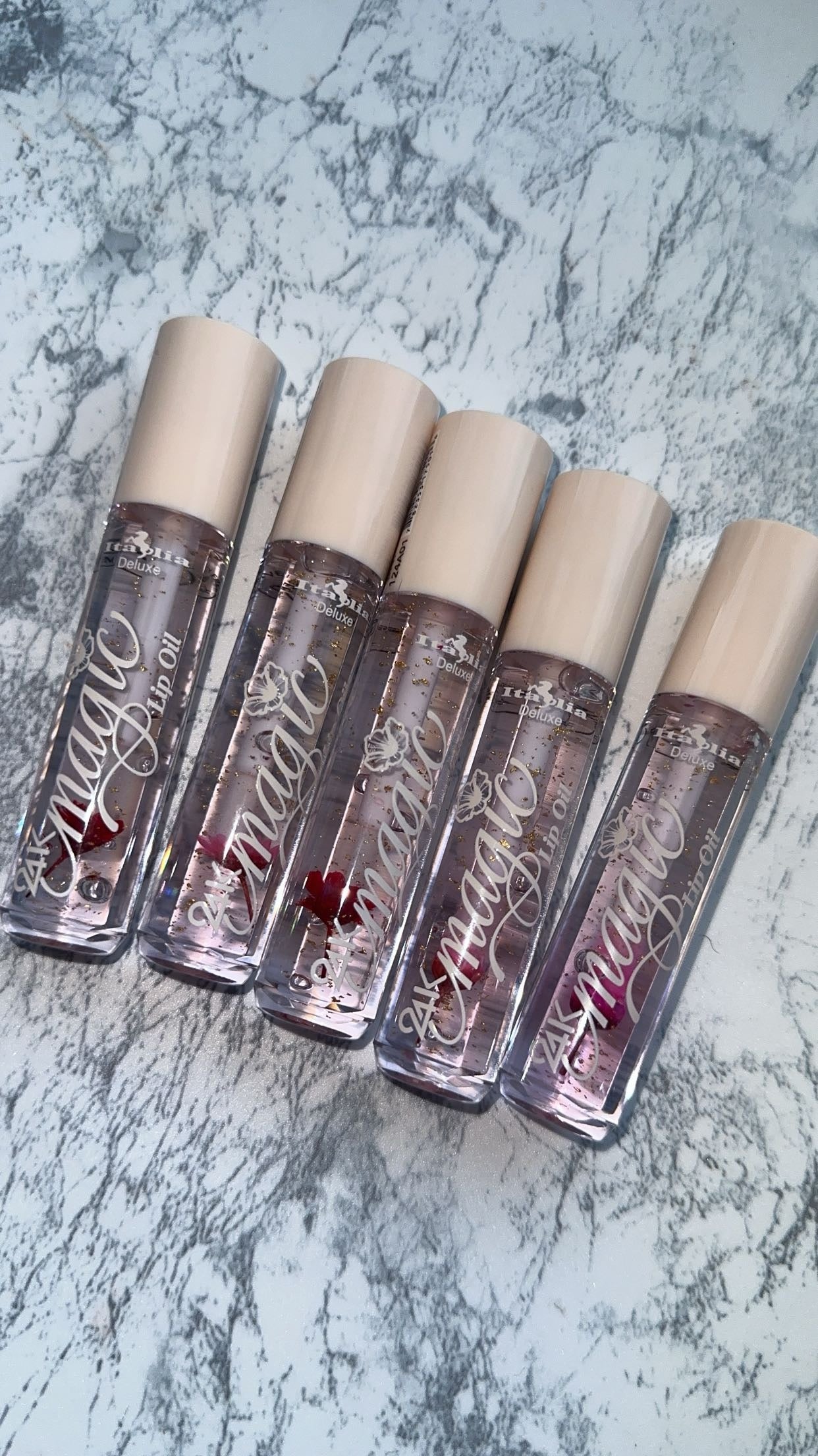 24k magic lip oil